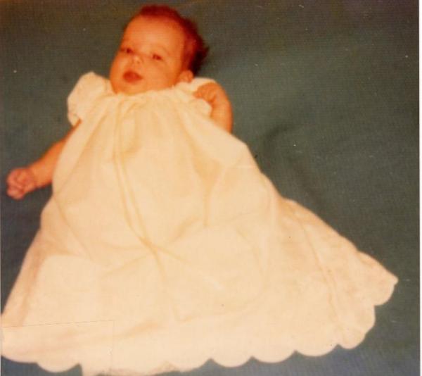 Me the day I was being christened, sometime in 1975.  I threw up when I was christened--my paternal grandmother said, "Only Gail's baby would do that."  At least I didn't pee in the holy water.