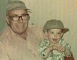 My grandfather and me.  I loved his dirty hats.  I was his little helper.  He would say, "Come on, little darlin."  I was game for...