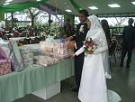 Shameel, my husband, and I looking at the gifts we received