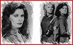 Diana, her reptilian side revealed in her eyes in the picture on the left (played by Jane Badler).  Standing with June Chadwick, who played...