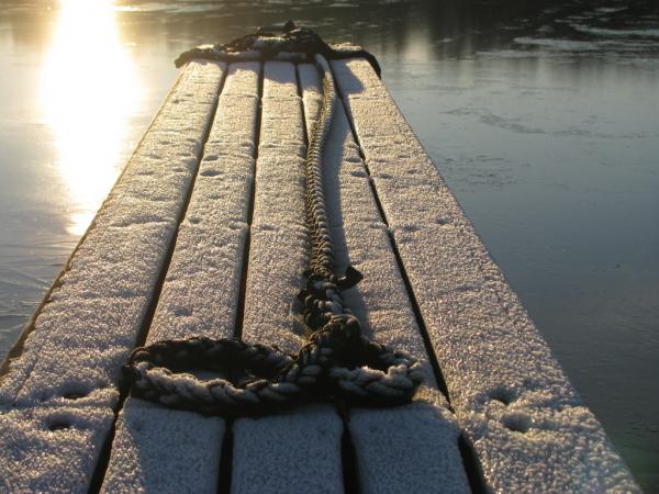 Frozen rope on dock at Sundbyholm Marina at Lake m�laren, outside Eskilstuna, on New Years Eve 2008