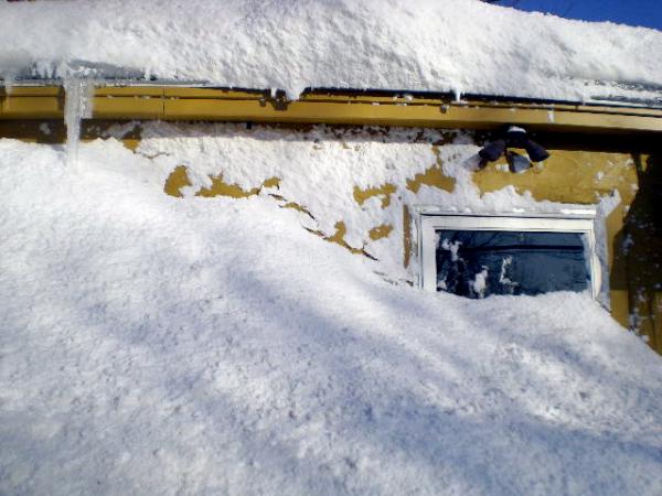 The big storm in December.  This is a little Italian market in Kittery Maine.  Note the front door!  It was buried!  Hahaha!