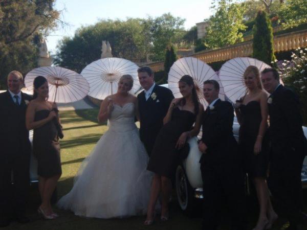 My sister's wedding, me fourth from right. My sister, the one in the big white poofy dress :lol: