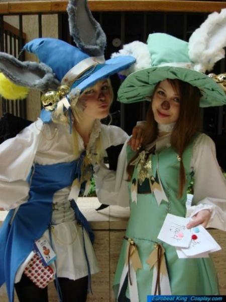 My best friend and I at the convention. This had to be really early-  we were SO tired, you can probably tell. This was about two years ago - now I've chopped all my hair off. :D 

(in case you're wondering, we're FFXII moogles. If that flies over your head, it's ok.)
