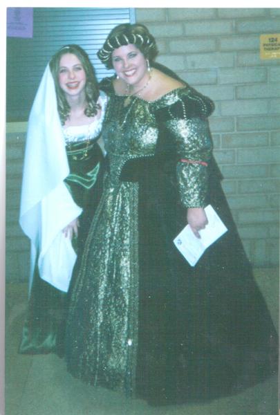 Madrigal Dinner (we dressed up like we lived in Narnia and sang a lot and there was a real boars head and fiery figgy pudding and lots of lovely songs. Oh. And me as Captain Jack Sparrow dancing to Men in Tights.). YA'LL, I MADE THAT DRESS. Kinda. I kind of... ripped it up, sewed it back together, and made it my own. :D That's mah chorus teacher.