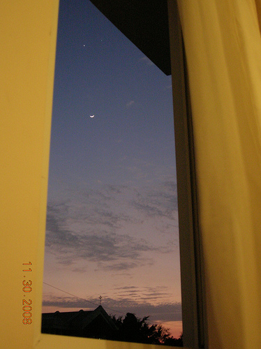 I�m here laying in my bed, 
wondering what is ahead
until you came 
with your embrace 
and showed me
the moon silluette.