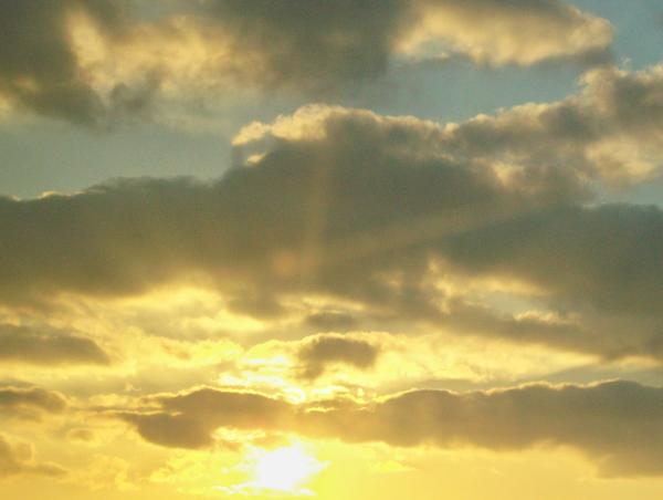 A Hott texas sunrise. Look Close and you can see a cross formed by the sunrays.