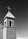 Holy Cross Catholic Church in Santa Cruz New Mexico.  
This is a detail shot I took of the bell tower as it appeared in the mid 1990's. Constructed...