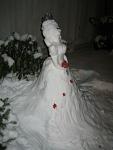 I've always loved snow, and building snowmen is great fun, though this one can hardly be called a snowMAN. Instead of the traditional "three...