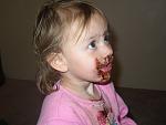 My daughter Julia.  "What chocolate, Mommy?"  She wasn't supposed to get into the jar of chocolate powder.  I found it all over the floor.