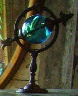 Cosmo Sphere -- found these in an architectural salvage place, don't know what they do or mean, but they look very necessary and cool.  I'd like to have a brand-new Mercedes with one of these instead of the normal hood ornament.