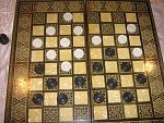 Checkers.  I was playing with my dad, nobody lost any pieces.  I moved last after he had to pass a shot, then there was nothing else we could do. ...