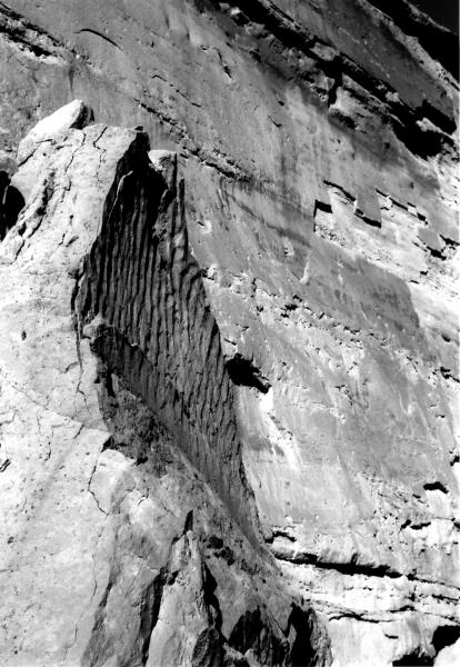 "Waves in the Sand" 
"Fossilized" waves or ripples in what was once loose sand now sandstone. This large boulder was part of a large rock mass that collapsed on a section of Pueblo Bonito at Chaco Culture NHP, New Mexico. See the Chaco Canyon thread.
Black & White film photo.
Pentax ME Super 35mm SLR
March 2010.