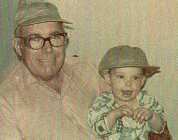 My grandfather and me.  I loved his dirty hats.  I was his little helper.  He would say, "Come on, little darlin."  I was game for anything--repairing the cars, talking on the CB radio, or our favorite activity--going to the local dump to see what treasure we could find that someone threw out.
