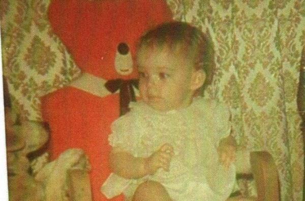 Me on my teddy bear throne that my grandpa had refurnished after finding it in the dump, looking at my grandparents' dog Daten like he is planning on usurping me.