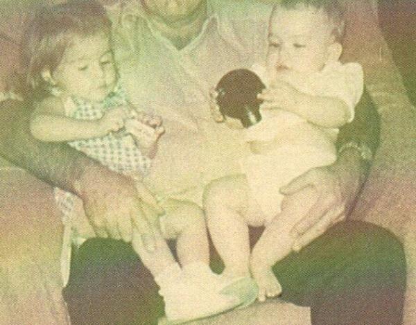 Me (on the right) and my cousin Jennifer as babies.  My grandpa always was able to amuse me with interesting toys--in this case, I think a part from a toilet tank.