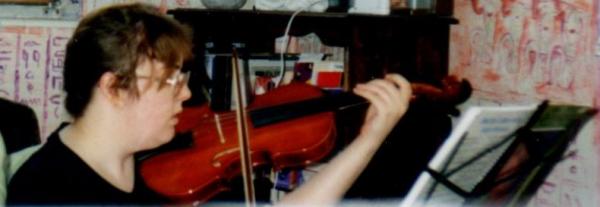 I pride myself in playing two musical instruments--the flute and the violin.  Of course, I don't play them well. (LOL)
