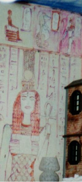 The smaller pictures depict Ancient Egyptian gods.  The large picture was of Xmen's Mystique, done in Egyptian style.